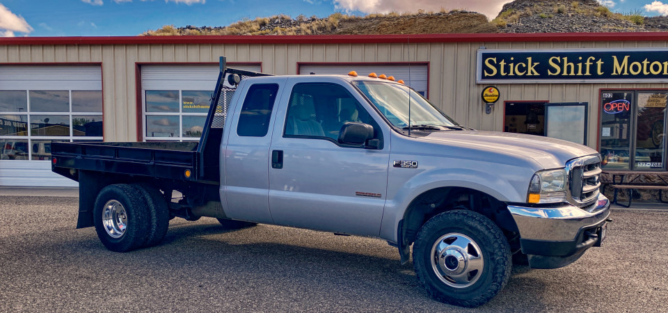2003 Ford F350 4x4 XLT Flatbed For Sale at Stickshift Motors Cody, WY