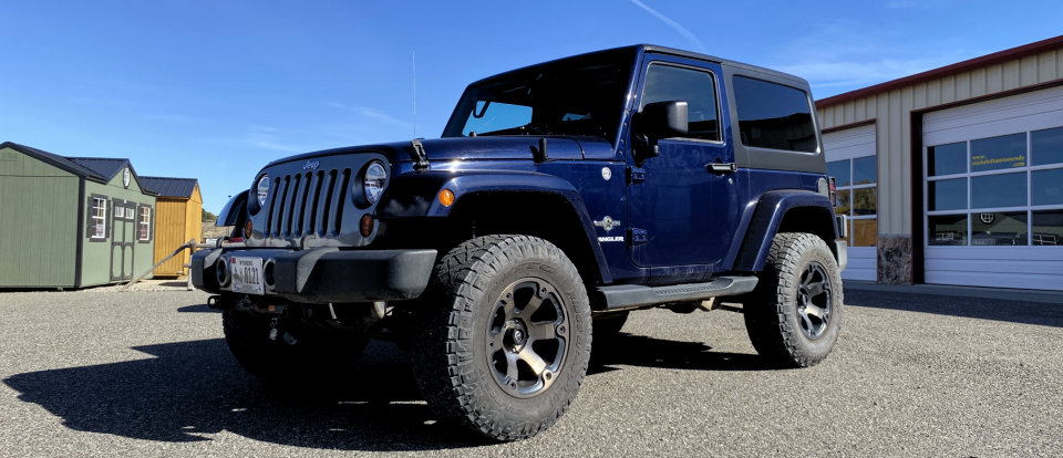 2012 Jeep Wrangler Oscar Mike For Sale at Stickshift Motors Cody, WY