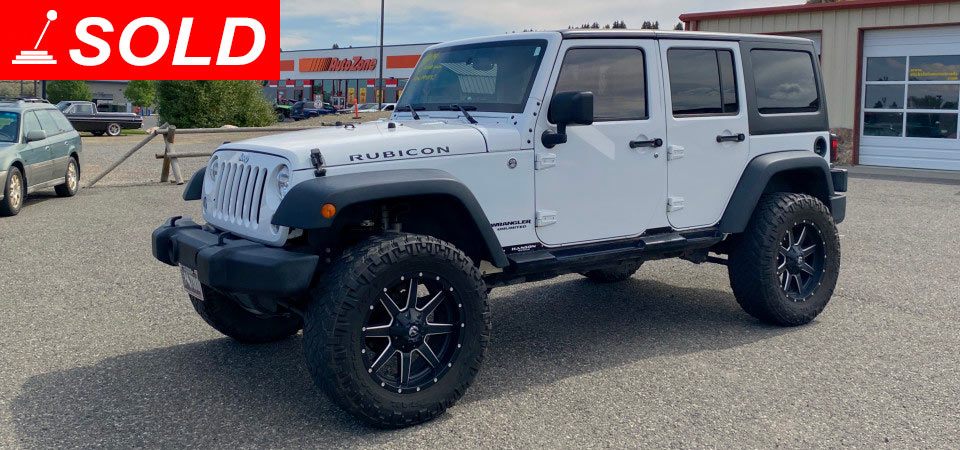 2014 Jeep Wrangler Unlimited Rubicon Sold at Stickshift Motors Cody, WY