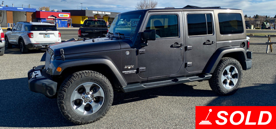2016 Jeep Wrangler Unlimited Sahara Sold at Stickshift Motors Cody, WY